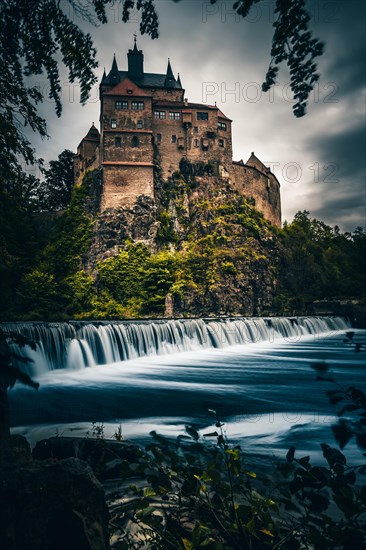 Viewpoint of Kriebstein Castle and Zschopau with a weir in the foreground