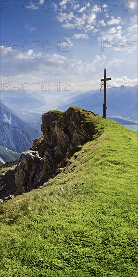 Summit cross of the Wankspitze with view into the Inn valley