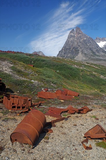 Rusted barrels from 1947 in Arctic landscape