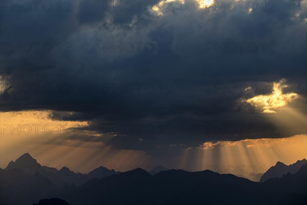 Sunrise with clouds over Allgaeu mountains