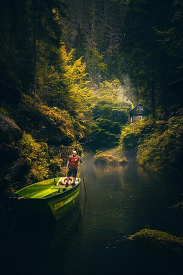 Autumn in the Edmundsklamm with river boat small house