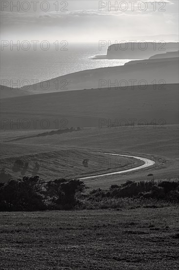 Winding country road overlooking the coast