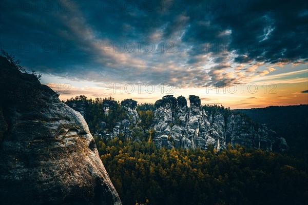 Schrammsteine with Falkenstein and Koenigstein at sunrise