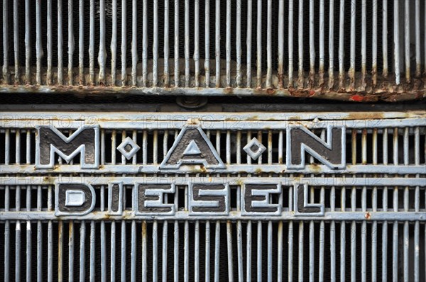 MAN Diesel emblem on the radiator grille of a MAN truck