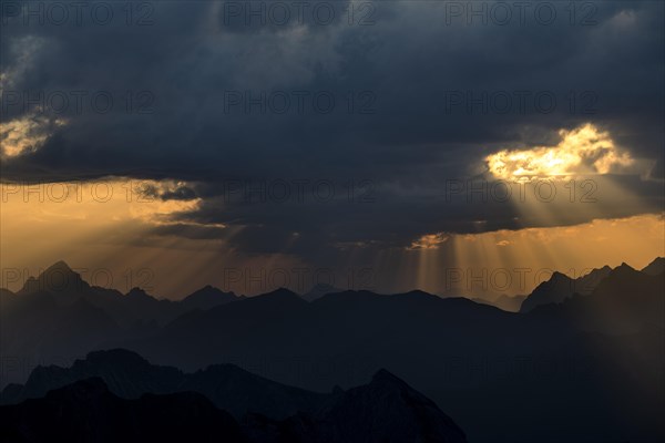 Sunrise with clouds over Allgaeu mountains