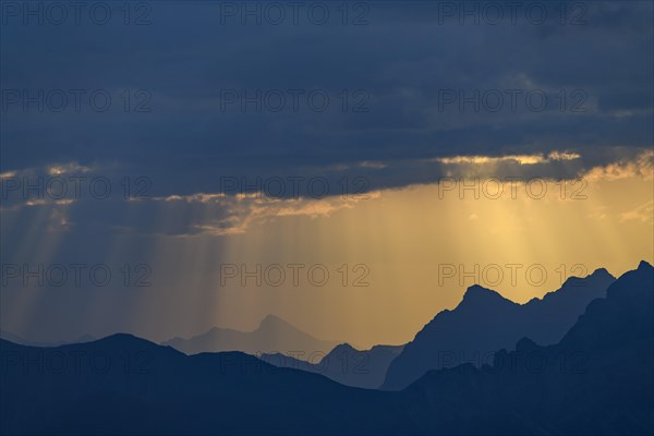 Sunrise with clouds over Allgaeu mountains