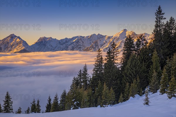 Winter mountain landscape with closed fog cover over the Inn valley