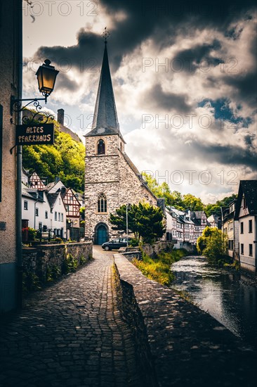 Historic town centre with half-timbered houses on the Elzbach and the ruins of the Loewenburg