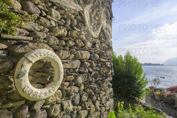 Lifebuoy with inscription Welcome to Corenno