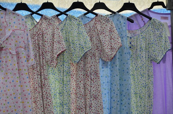 Nightdresses on hangers at market