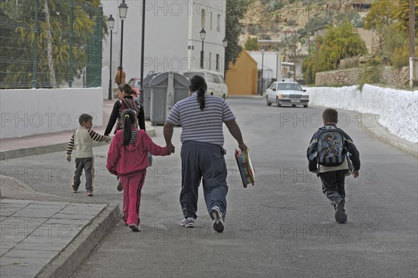 Parents and children on the street