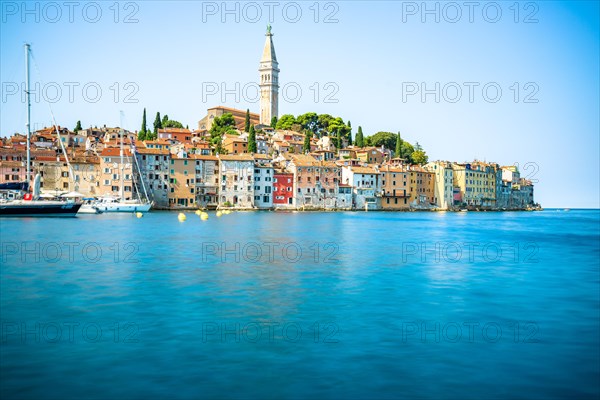 Island with Historical Mediterranean Town by the Sea. Bay with harbour