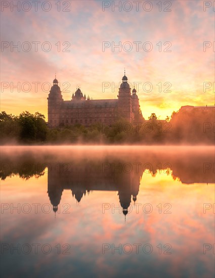 Johannisburg Castle reflected in the Main River