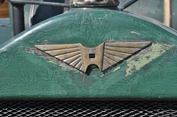 Hanomag logo on green metal from tractor