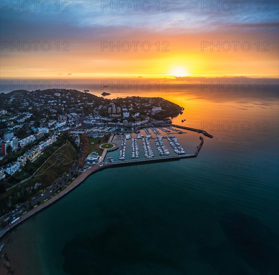 Panorama over Torquay and Torquay Marina from a drone in sunrise time