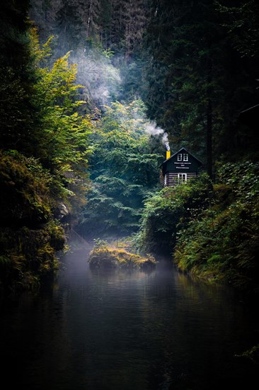 Autumn in the Edmundsklamm gorge with river small house