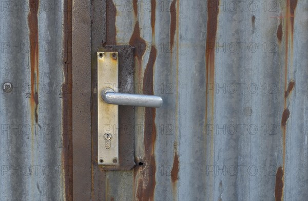 Handle from door of corrugated iron garage