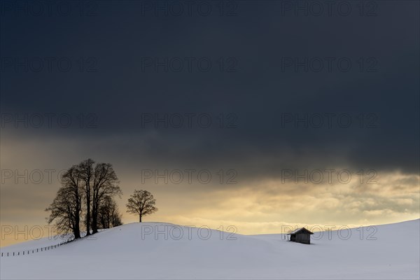 Winter landscape against a dramatic sky