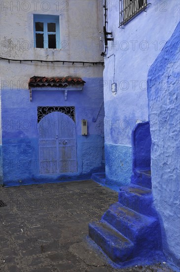 Staircase with blue houses