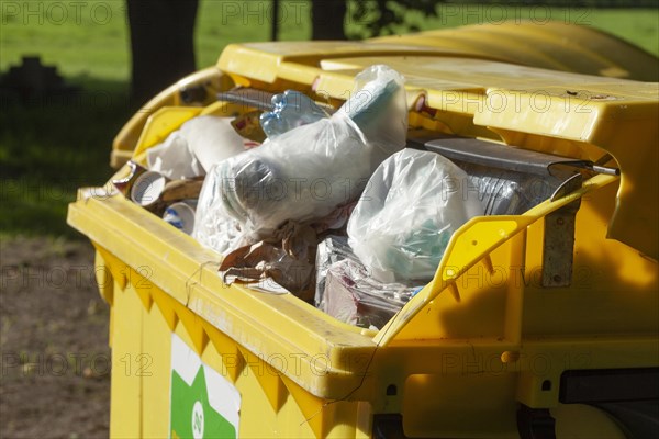 Yellow bin for plastic waste