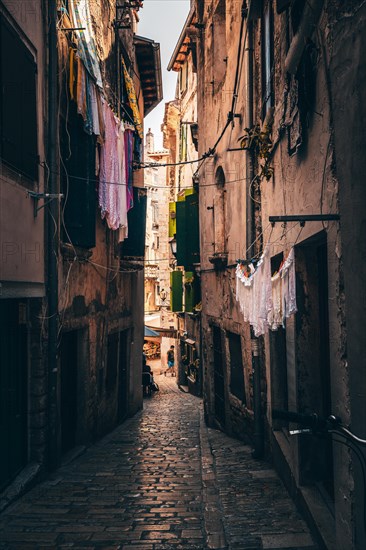 Laundry drying on the line in an alley in the old town