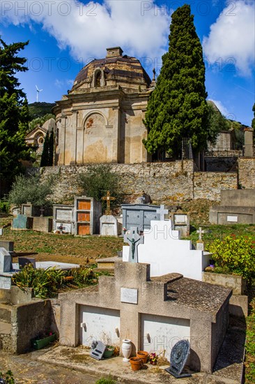 Rogliano on the hillside with several churches and a cemetery with magnificent family tombs