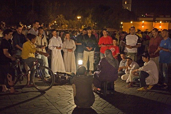 Storyteller in front of an eager audience