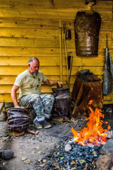 Demonstration of bronze casting production