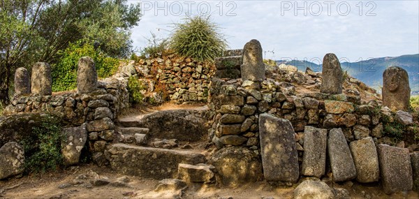 Central monument with menhir statues