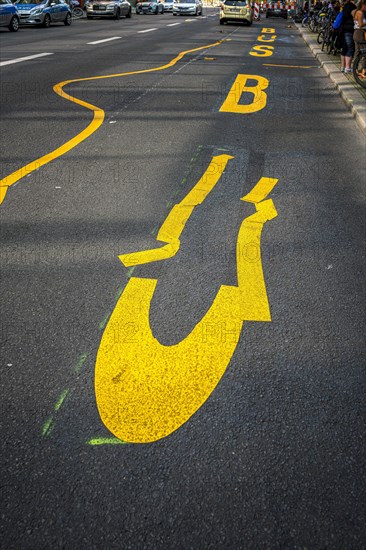 Crooked and crooked letters on a bus lane