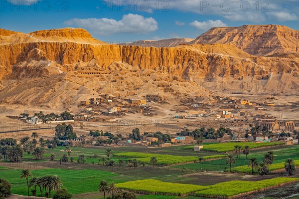 In the background Ramesseum and view of the tombs of the nobles