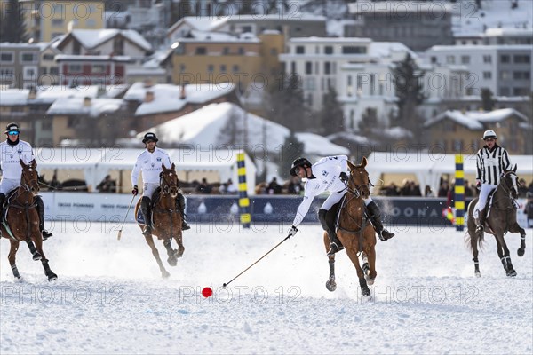 Valentin Novillo Astrada of Team Maserati tries to hit the ball with the stick