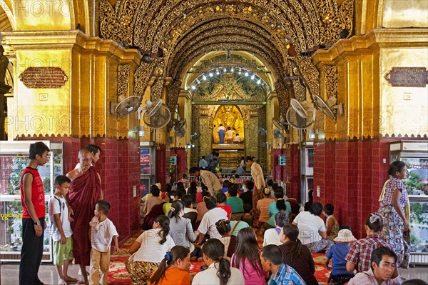 Buddha statue dressed in gold plate