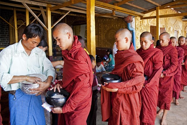 Rice feeding at the inauguration ceremony of A Lo Taw Pauk Pagoda