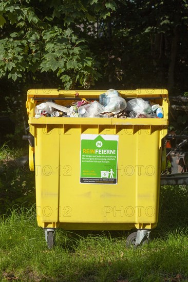 Yellow bin for plastic waste