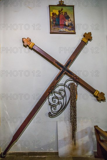 Cross with chains in the church of Saint-Marie