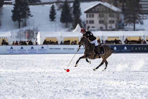 Alejandro Novilla Astrada rides the ball across the pitch at full gallop