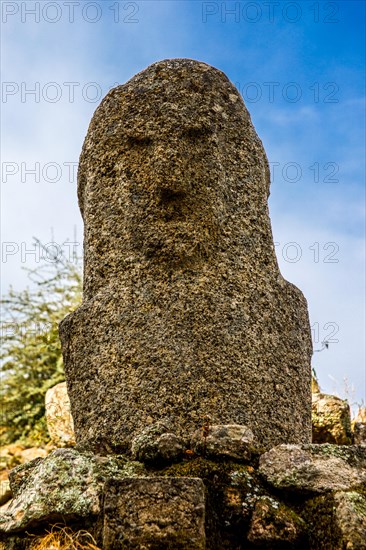 Central monument with menhir statues