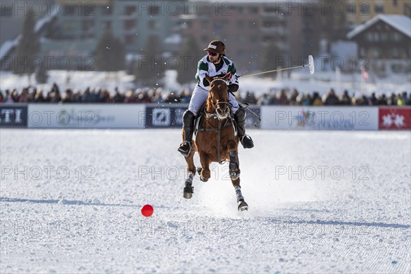 Santiago Marambio of Team Azerbaijan Land of Fire rides at full gallop after the ball