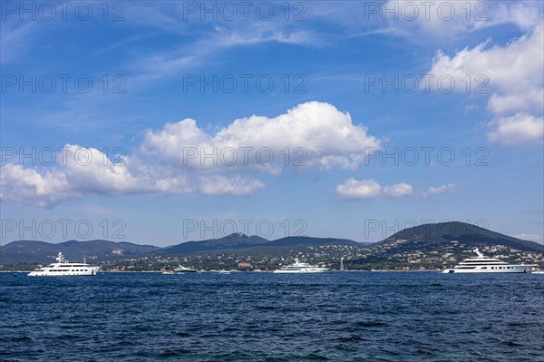 Luxury yachts anchoring in the bay of Saint Tropez