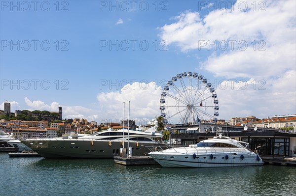 Luxury yachts anchor in the harbour of Cannes