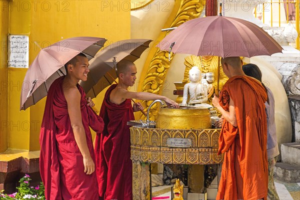 Monks at the ceremonial ablution of the Nats