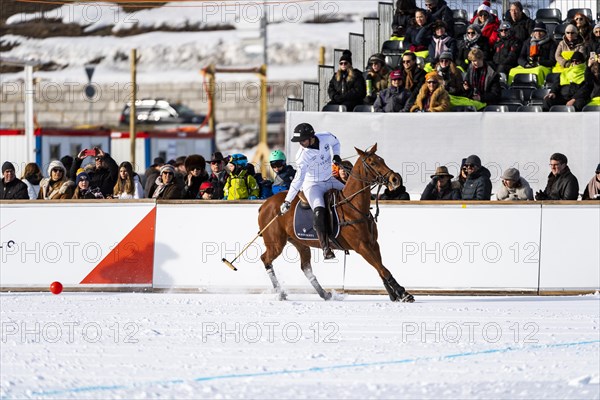 Spectators watching Valentin Novillo Astrada of Team Maserati on the rail