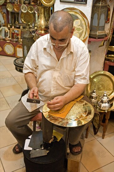 Artful coppersmithing in the souks of Fes