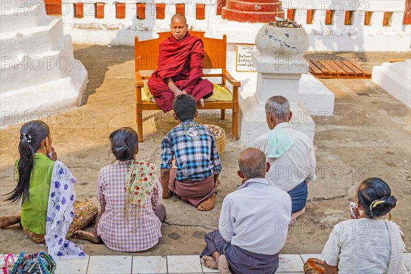 Teaching the faithful by monk in Shwezigon Pagoda