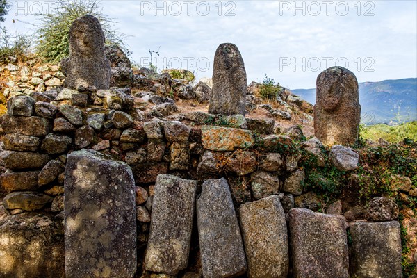 Central monument with menhir statues