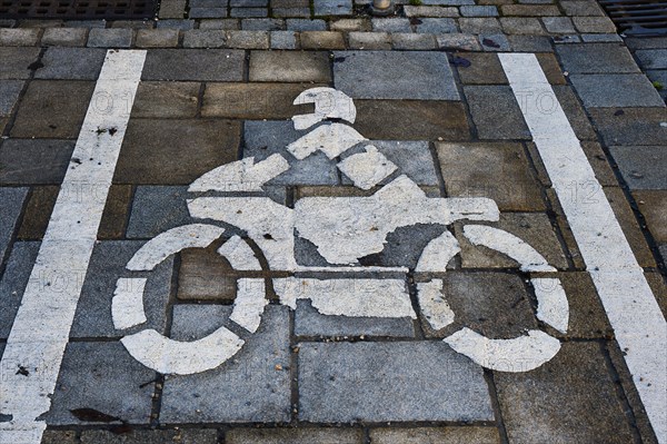 Parking space marking on pavement with motorbike pictogram in Kempten Allgaeu