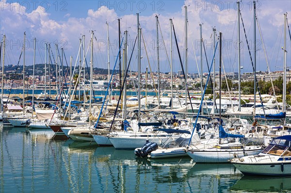 Sailing yachts anchored in the harbour of Cannes
