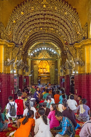 Buddha statue dressed in gold plate