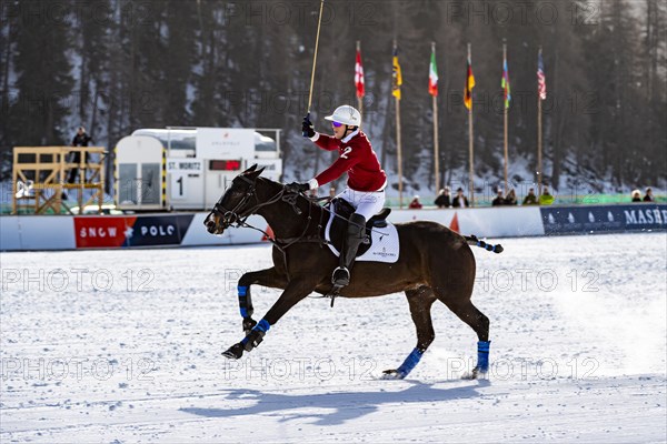 Robert Strom of Team St. Moritz in full gallop